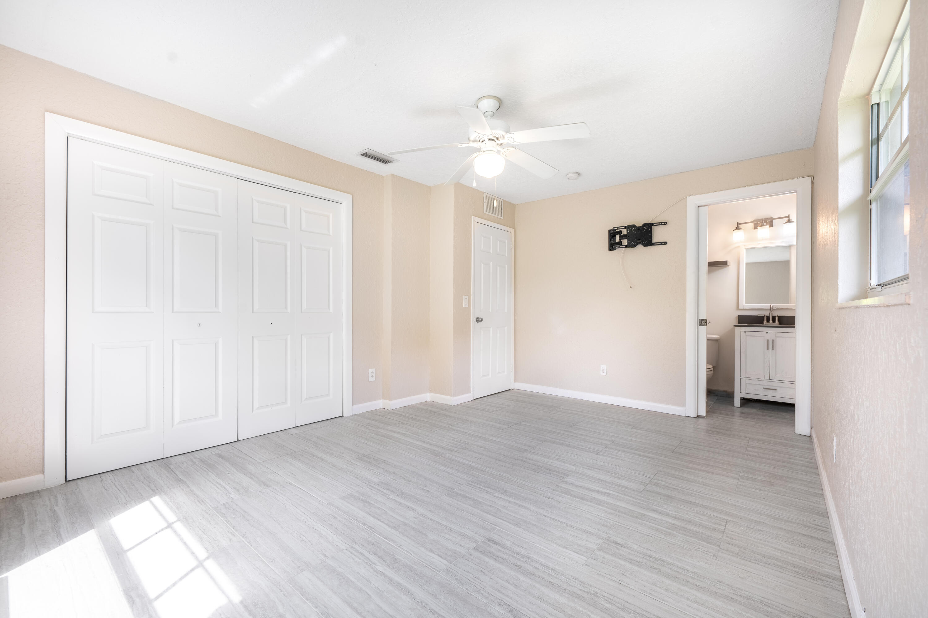 1219 South 10th Street Fort Pierce, FL 34950 - Photo 6 of 29 wooden floor in an empty room