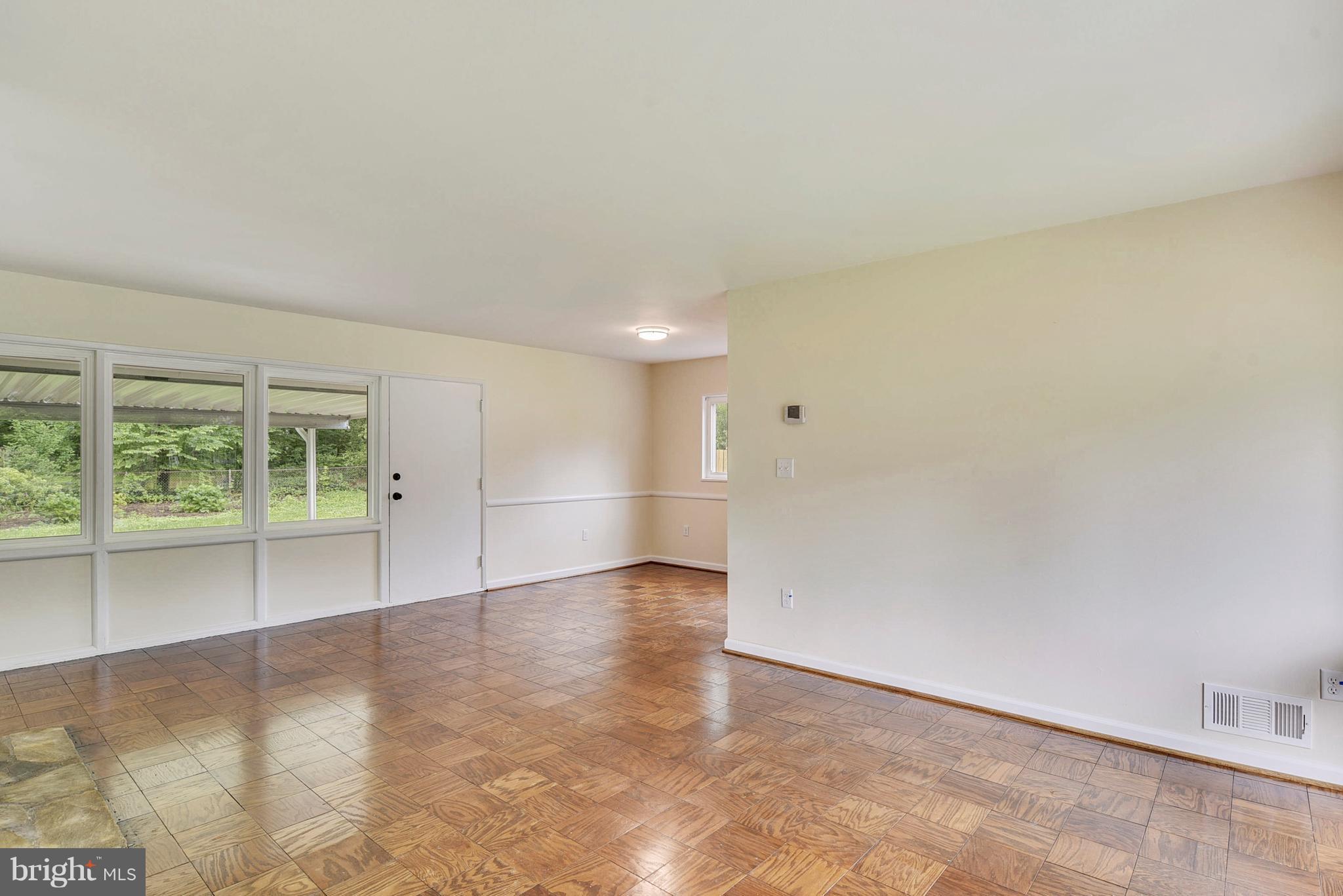 7303 Axton Street Springfield, VA 22151 - Photo 6 of 30 Dining Room with lots of windos and door to patio