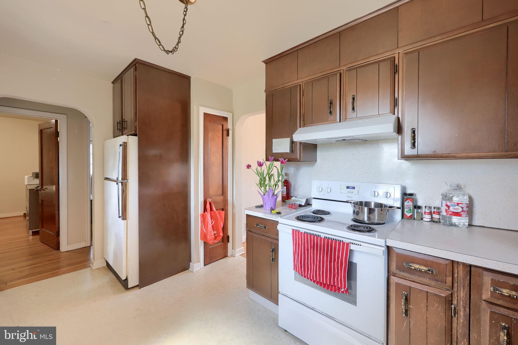 328 West Maple Street Dallastown, PA 17313 - Photo 15 of 37 a kitchen with stainless steel appliances granite countertop a refrigerator and a stove