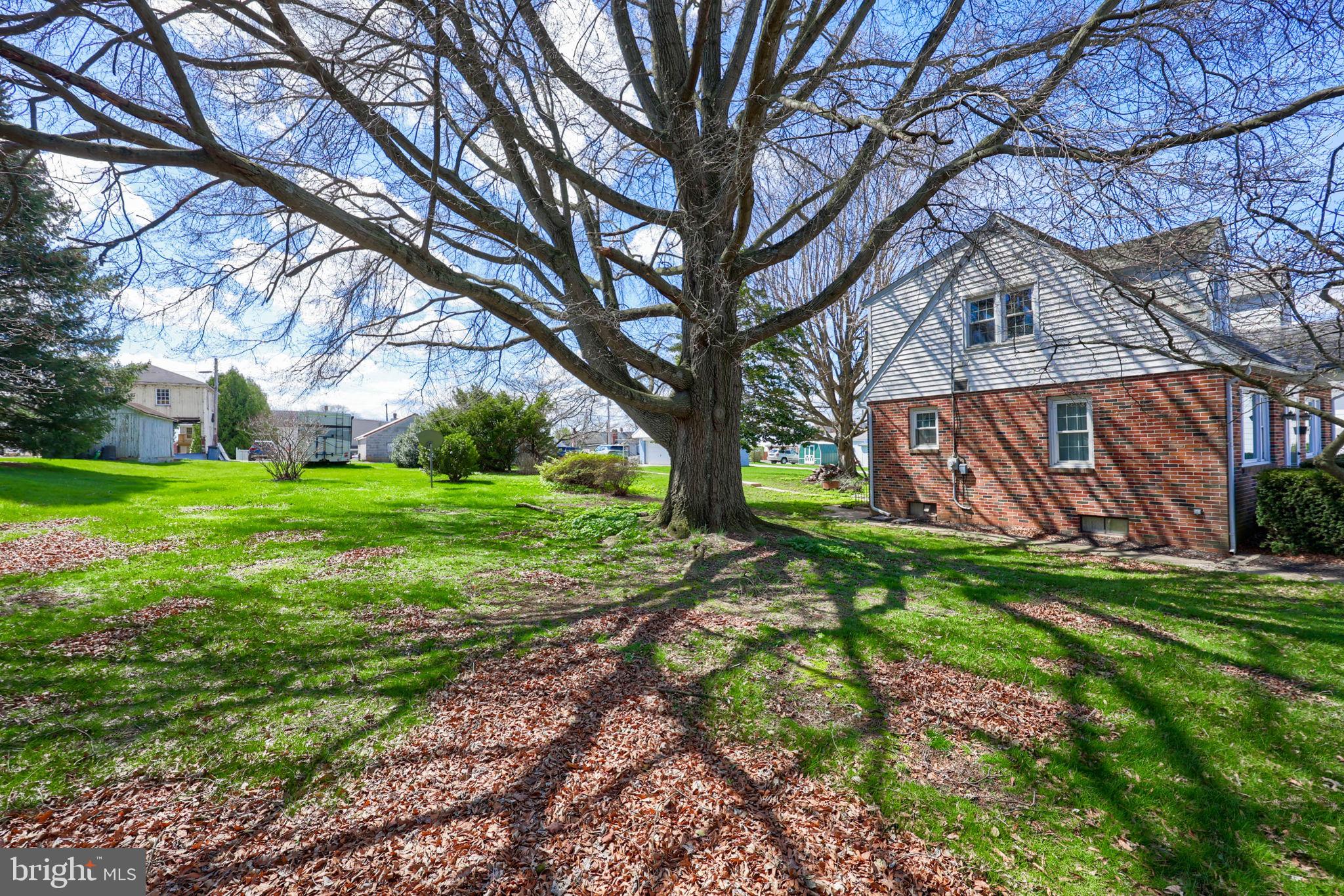 328 West Maple Street Dallastown, PA 17313 - Photo 23 of 37 a backyard of a house with lots of green space