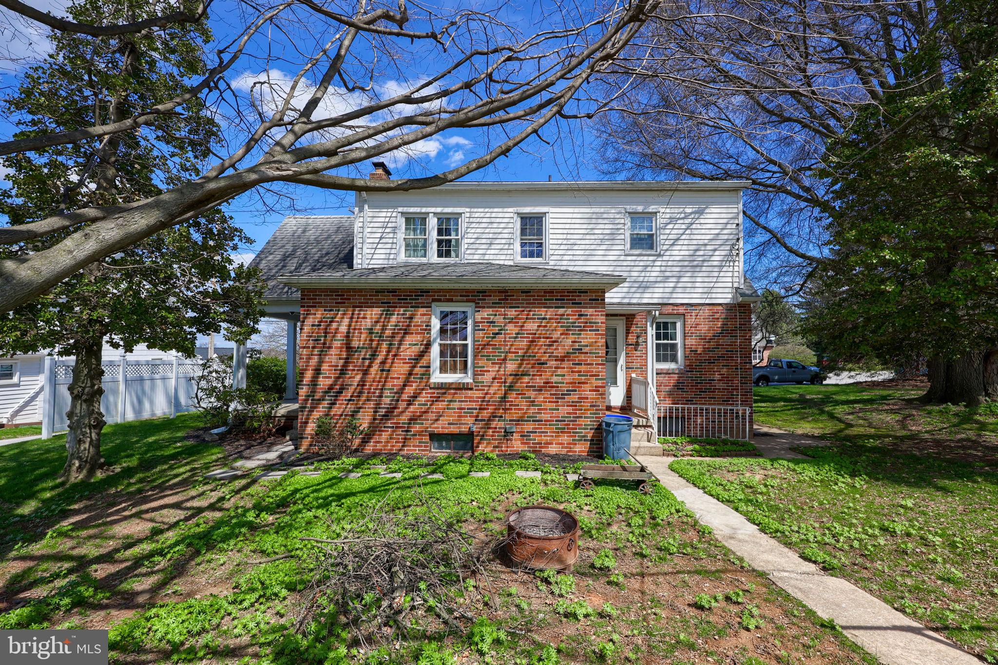 328 West Maple Street Dallastown, PA 17313 - Photo 24 of 37 front view of a house with a yard