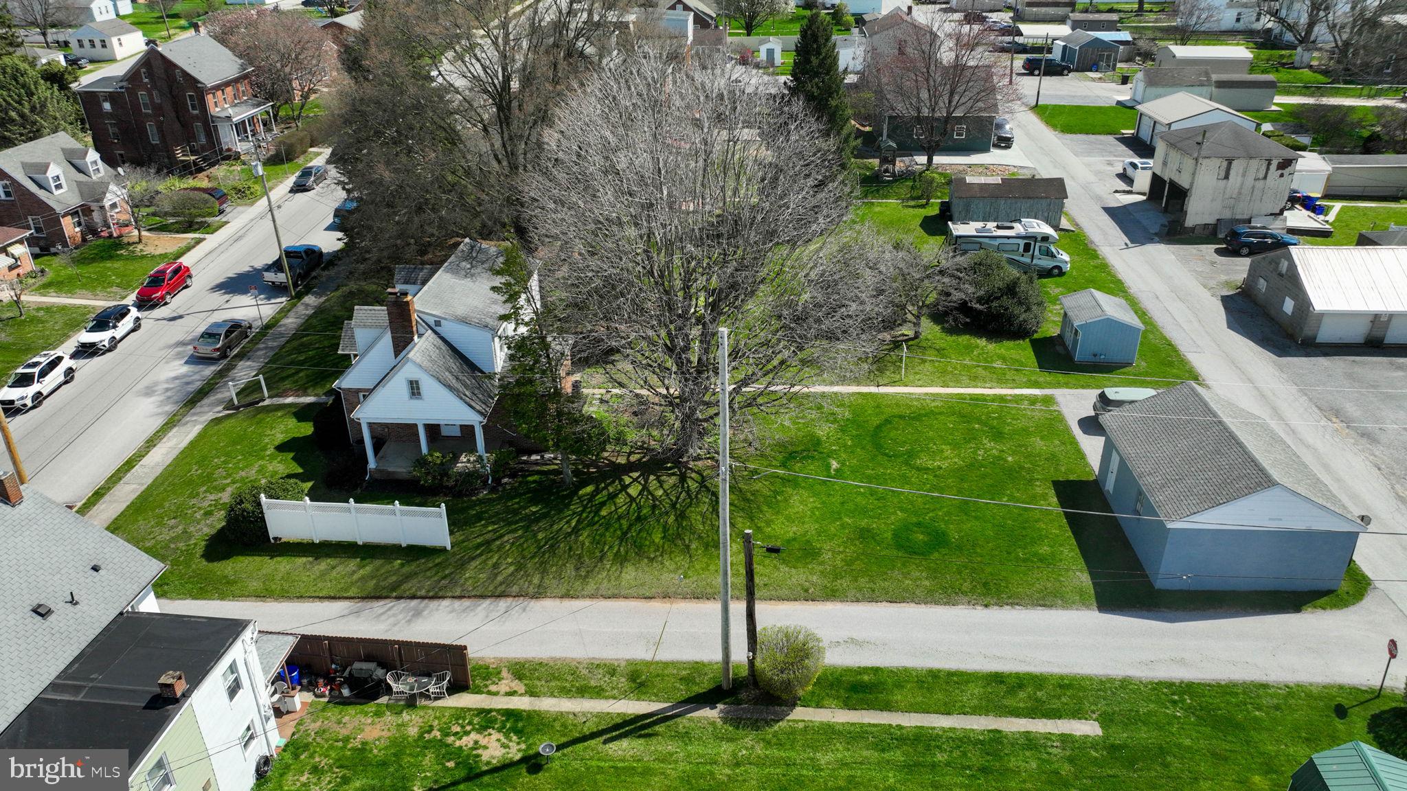 328 West Maple Street Dallastown, PA 17313 - Photo 30 of 37 an aerial view of multiple houses with yard