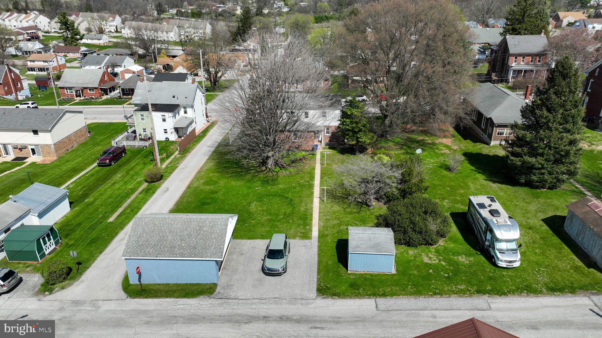 328 West Maple Street Dallastown, PA 17313 - Photo 32 of 37 an aerial view of a house with garden space and street view