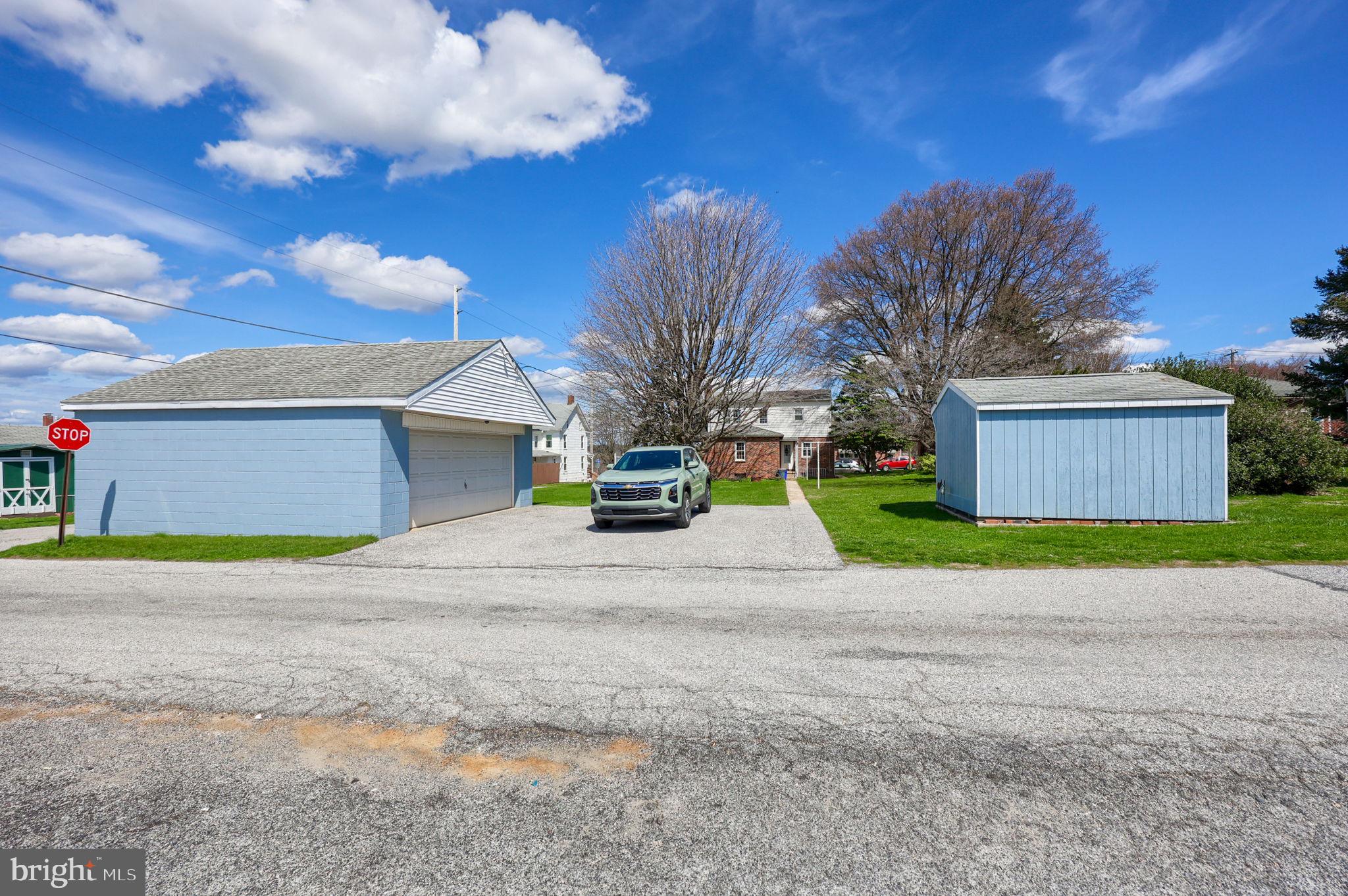 328 West Maple Street Dallastown, PA 17313 - Photo 5 of 37 a front view of a house with a yard and garage