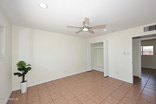 a view of a livingroom with a potted plant