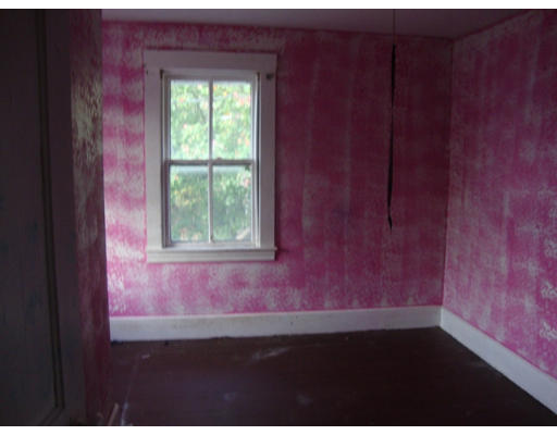 813 West Shore Road Warwick, RI 02889 - Photo 4 of 8 a view of an empty room with a window