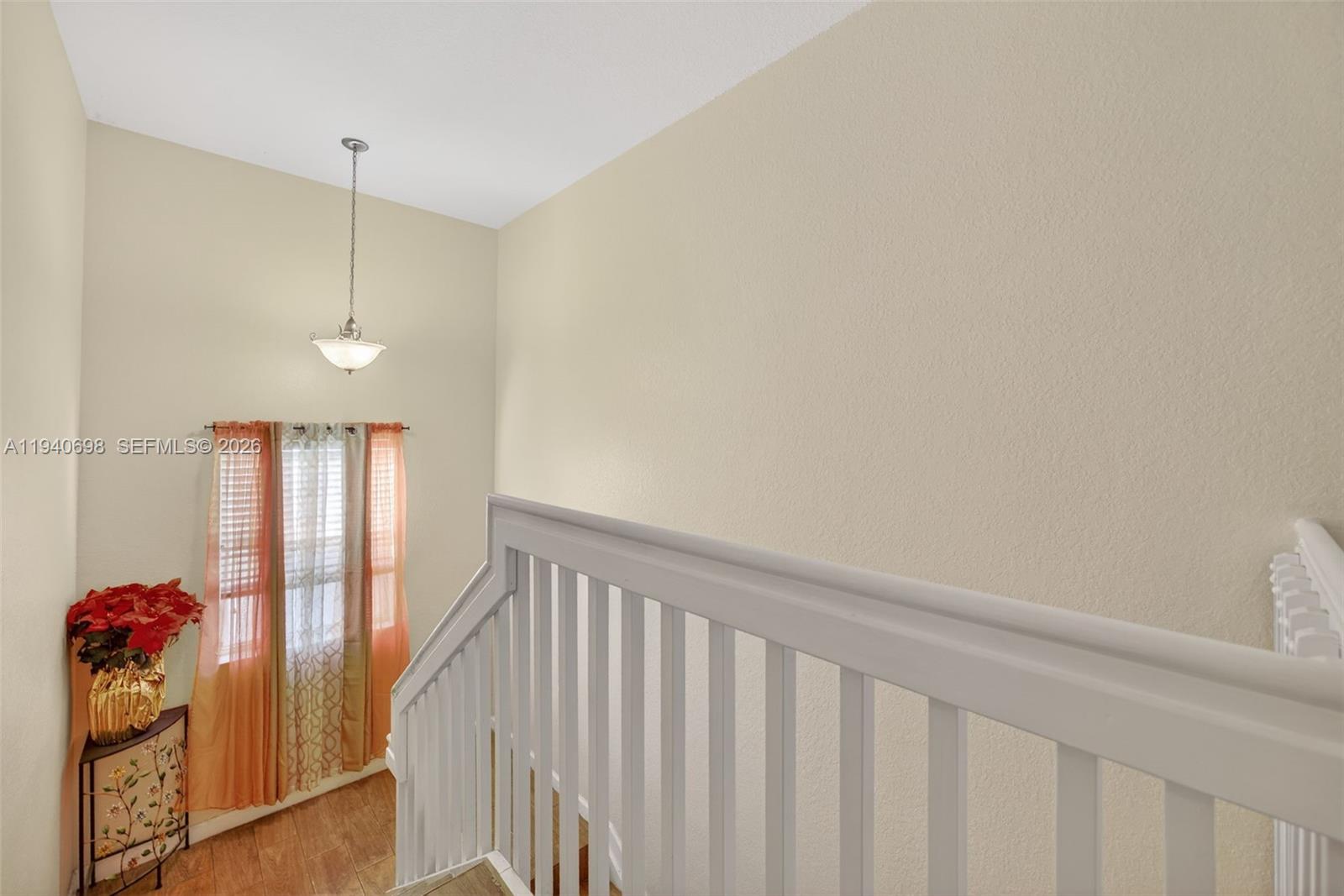 367 Northeast 36th Avenue Road Homestead, FL 33033 - Photo 14 of 36 a view of a hallway with windows