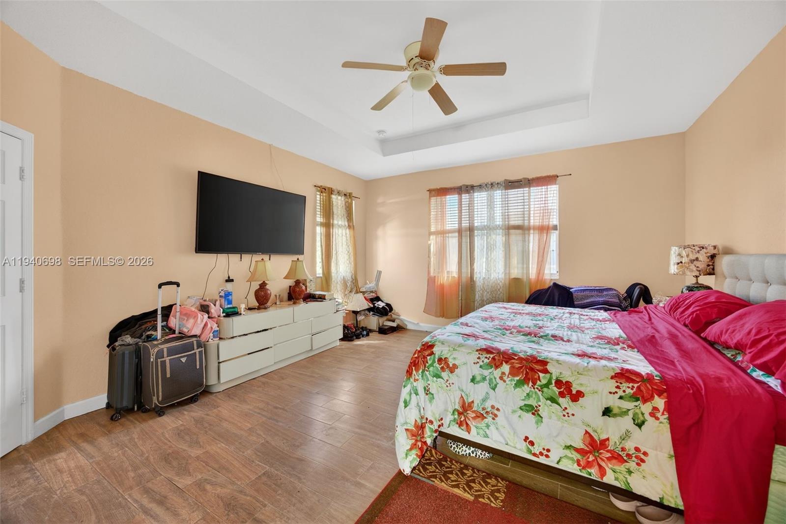 367 Northeast 36th Avenue Road Homestead, FL 33033 - Photo 16 of 36 a bed room with a bed television and a bed