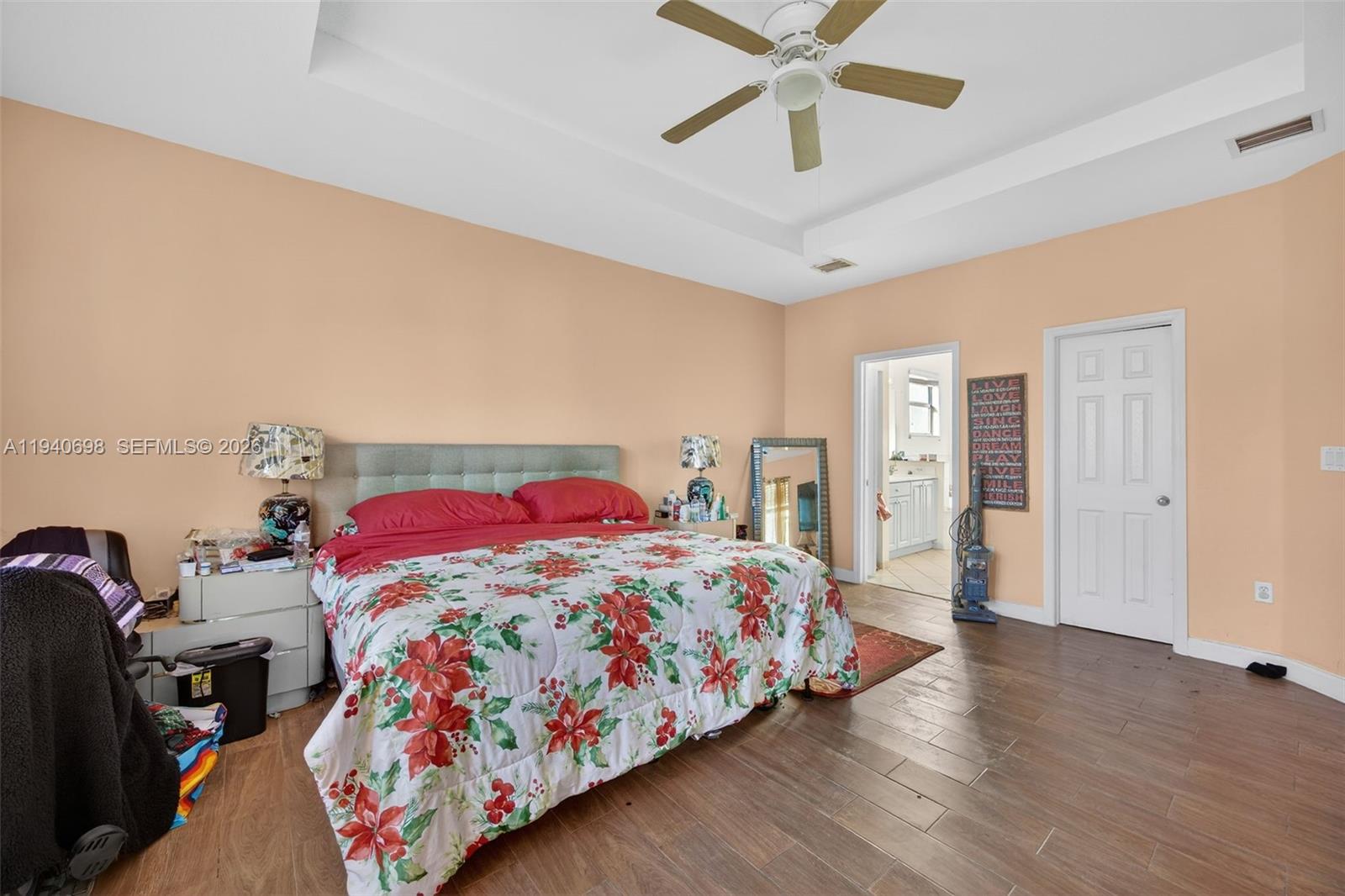 367 Northeast 36th Avenue Road Homestead, FL 33033 - Photo 17 of 36 a bedroom with a bed and wooden floor