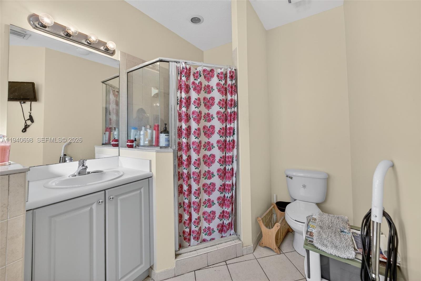 367 Northeast 36th Avenue Road Homestead, FL 33033 - Photo 20 of 36 a bathroom with a double vanity sink mirror and toilet