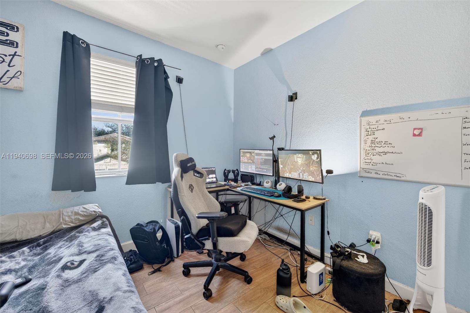 367 Northeast 36th Avenue Road Homestead, FL 33033 - Photo 28 of 36 a view of a workspace with furniture and a window