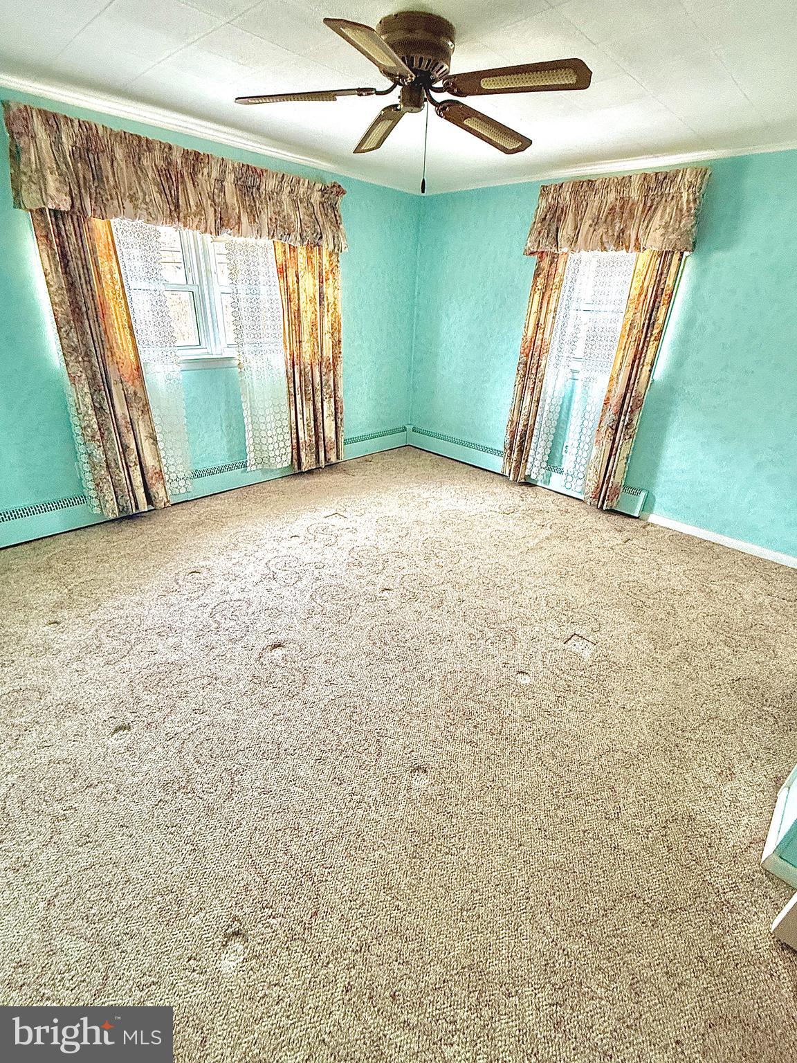 320 South Bonsall Road Coatesville, PA 19320 - Photo 24 of 36 view of room with window and ceiling fan