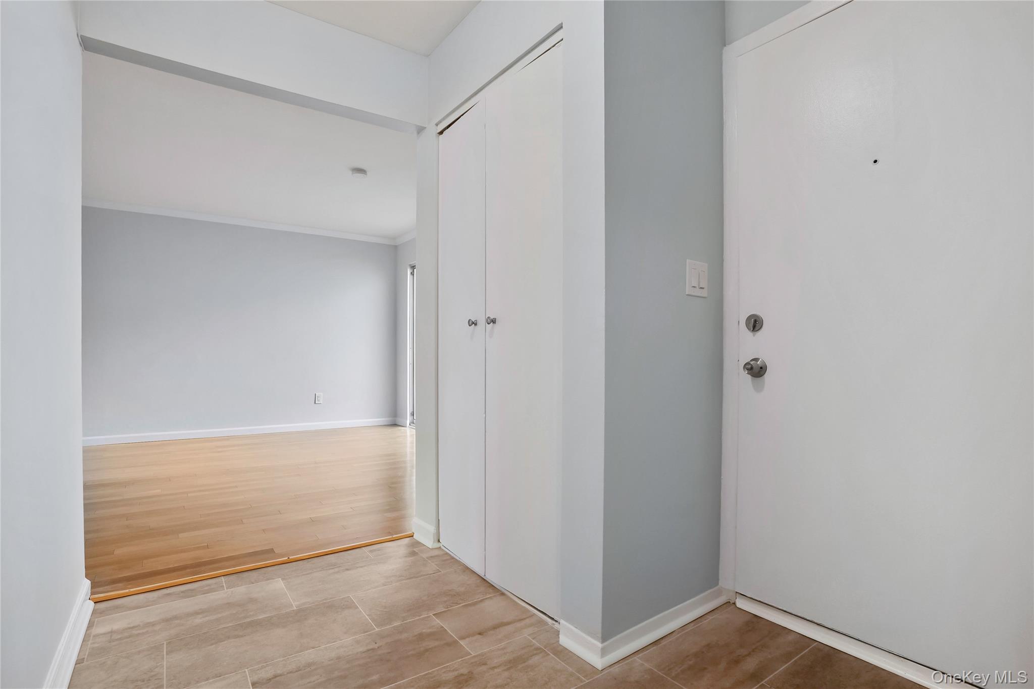 208 Harris Road, Unit HA3 Bedford, NY 10507 - Photo 25 of 41 Hallway featuring crown molding and baseboards