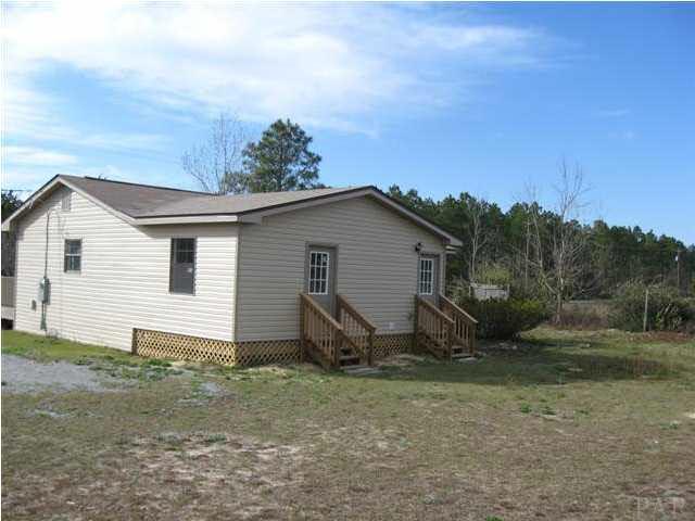 5040 Bodega Road Milton, FL 32583 - Photo 3 of 13 Back of home with new steps at both entrances