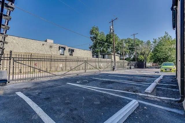 2805 Reagan Street, Unit 109 Dallas, TX 75219 - Photo 3 of 4 a view of a tennis court