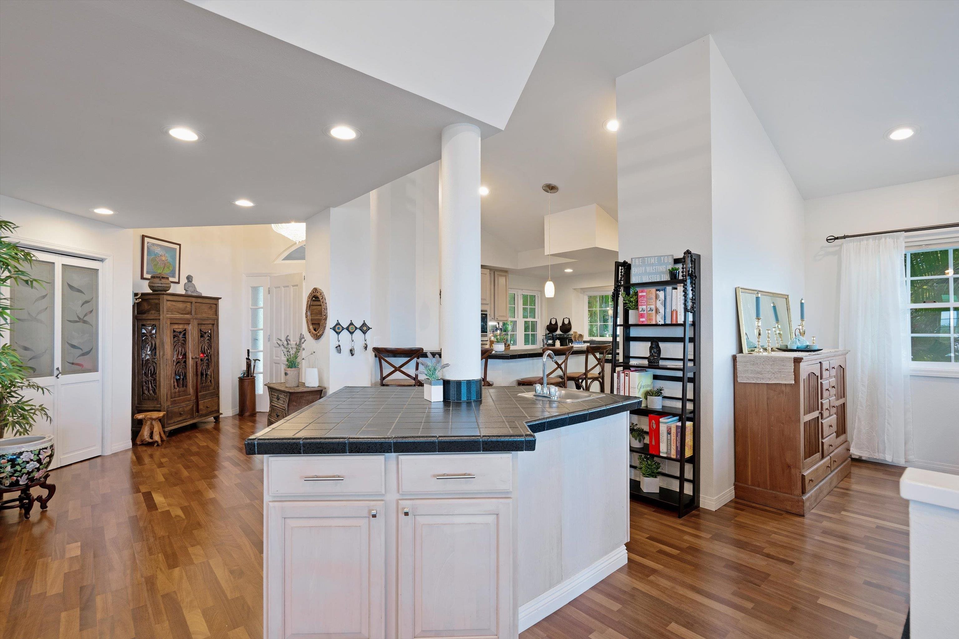 571 South Alu Road Wailuku, HI 96793 - Photo 16 of 49 a kitchen with sink refrigerator and cabinets