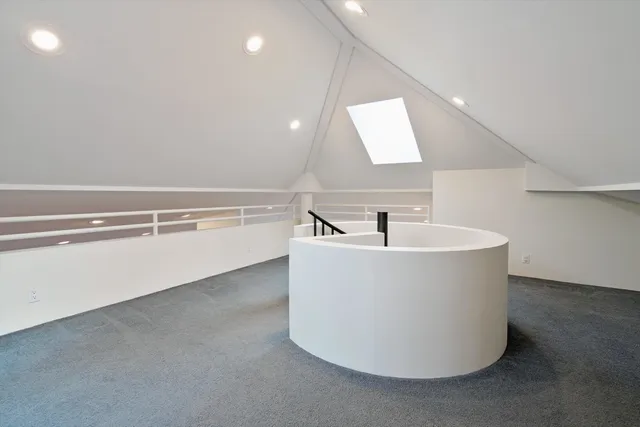 a white bath tub sitting in a room