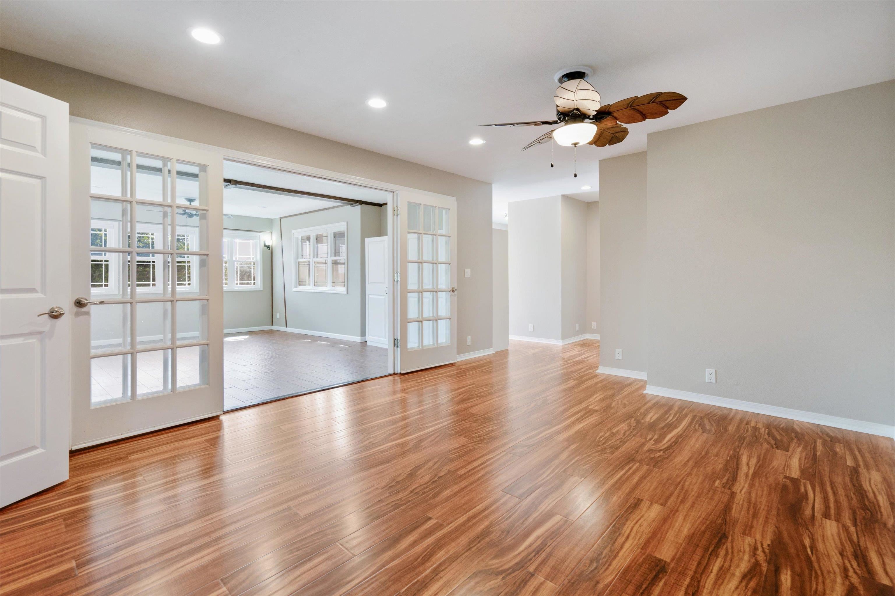 571 South Alu Road Wailuku, HI 96793 - Photo 38 of 49 a view of an empty room with wooden floor and a window
