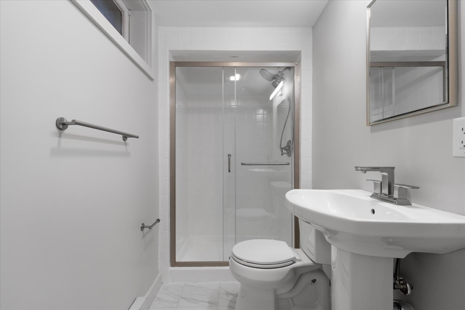 162 Main Street Osterville, MA 02655 - Photo 36 of 47 a bathroom with a sink toilet and shower