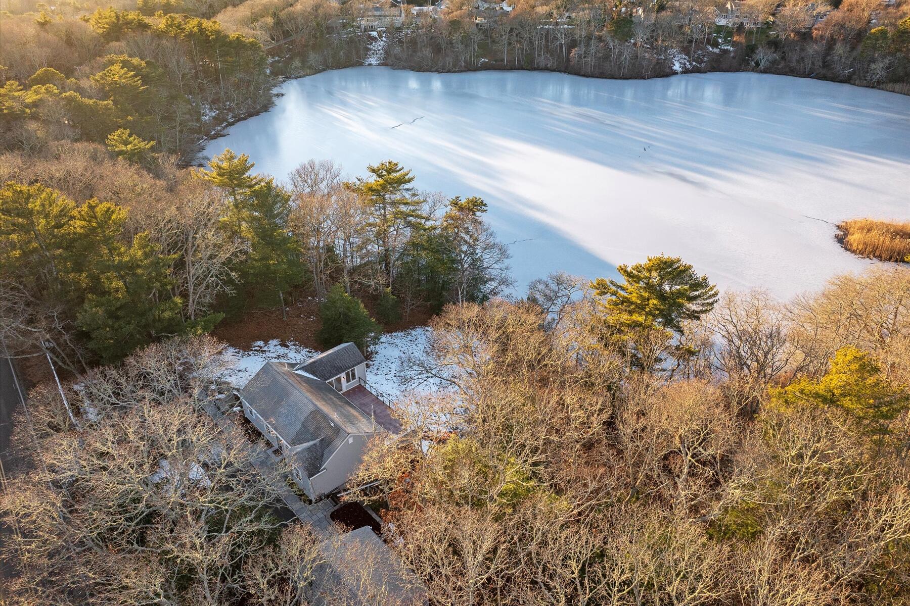 162 Main Street Osterville, MA 02655 - Photo 39 of 47 a view of a lake with a mountain
