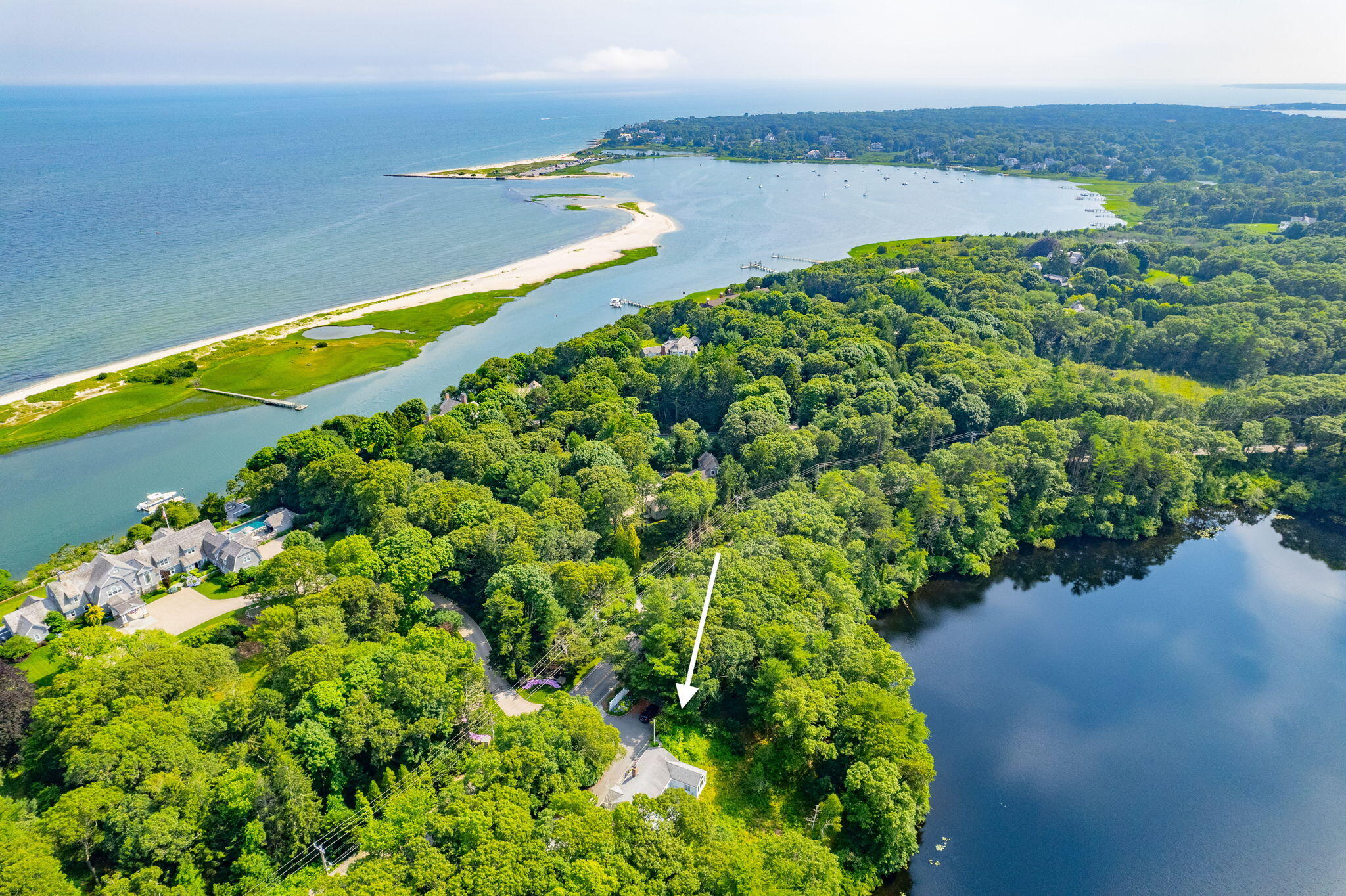 162 Main Street Osterville, MA 02655 - Photo 46 of 47 a view of a yard with a lake view