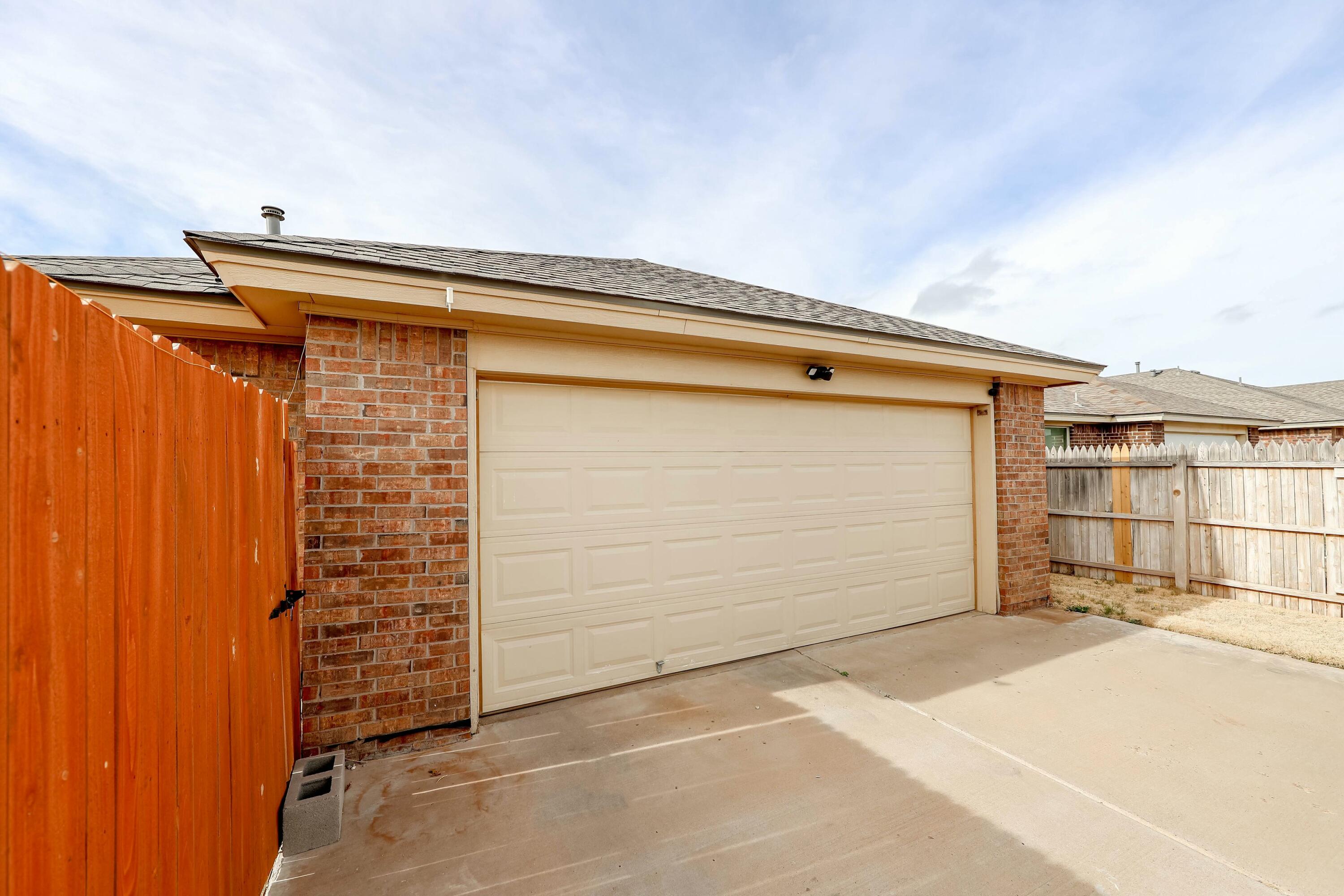 5920 104th Street Lubbock, TX 79424 - Photo 24 of 26 a view of outdoor space garage and yard