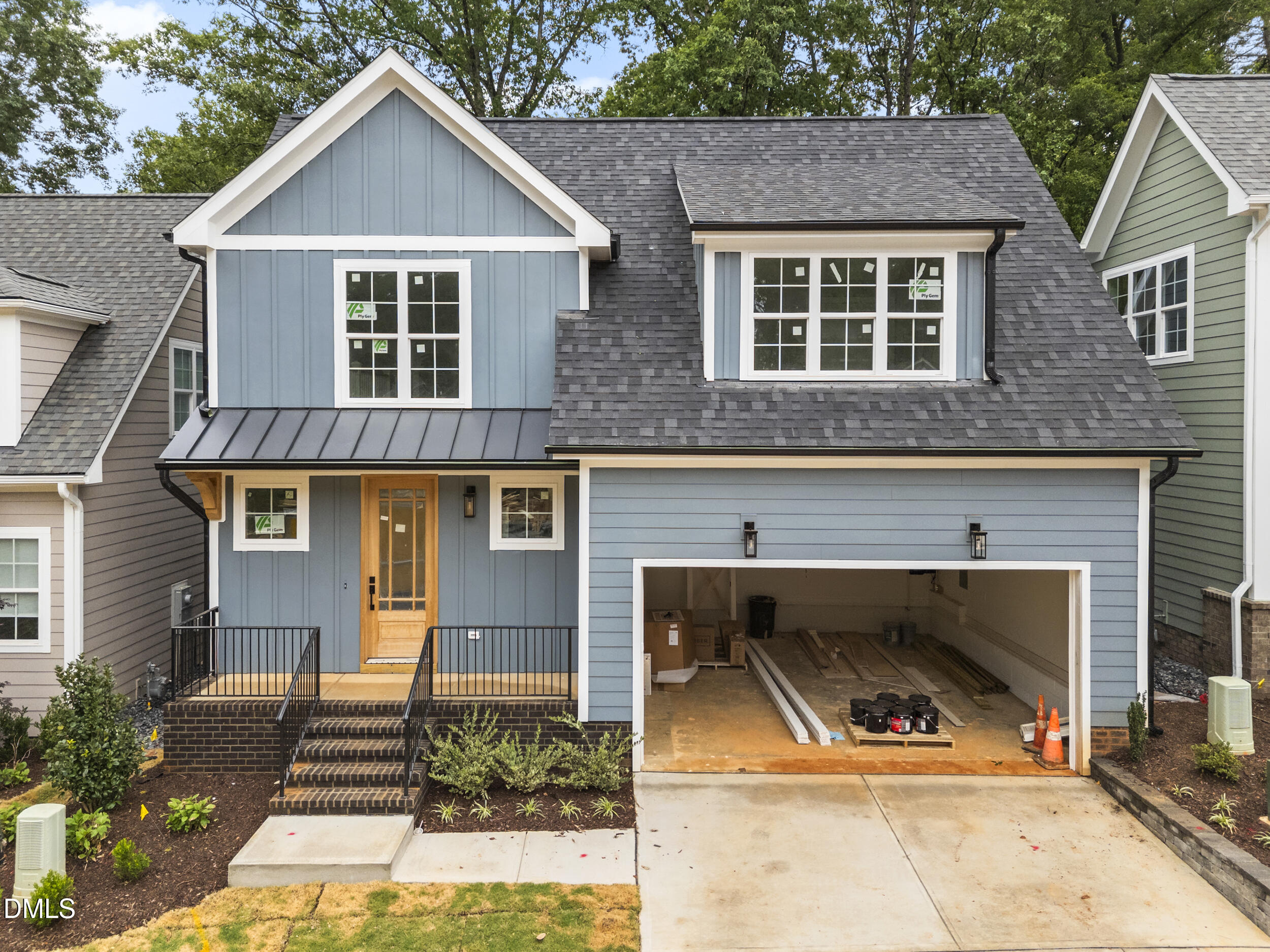 a front view of a house with yard