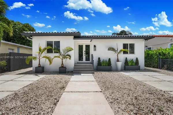 a view of a house with patio
