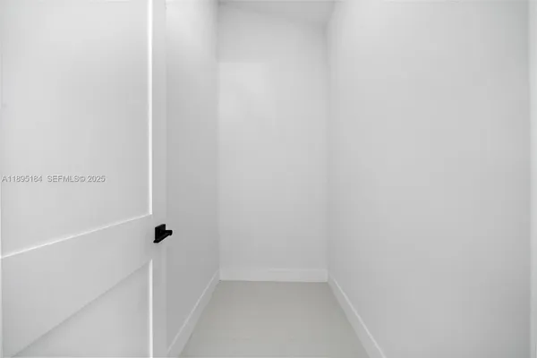 a bathroom with a shower and a toilet