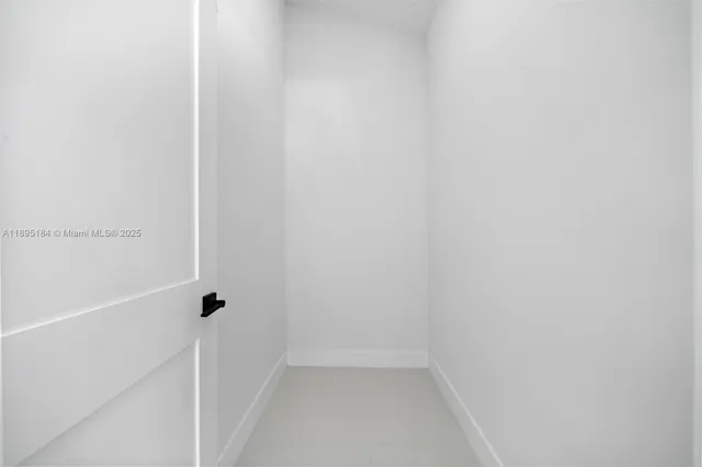 a bathroom with a shower and a toilet