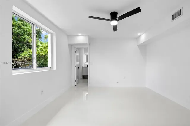 a view of an empty walk in closet