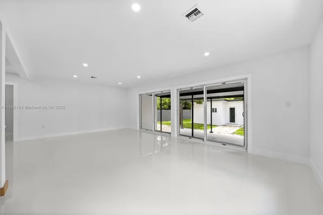 a view of an entrance with wooden fence