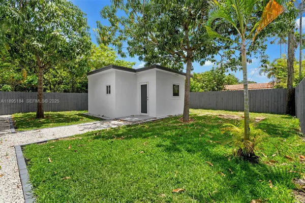 a big room with closet and windows