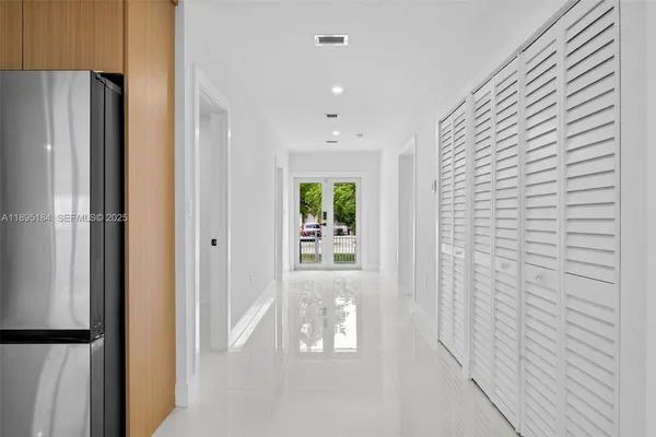 a bathroom with a bathtub and shower