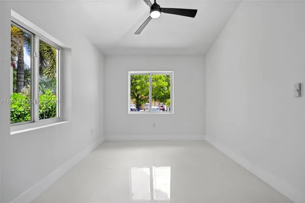 an empty room with windows