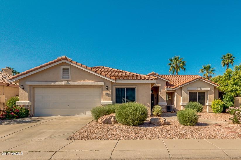 4030 West Cactus Road Phoenix, AZ 85029 - Photo 1 of 29 a front view of a house with a yard