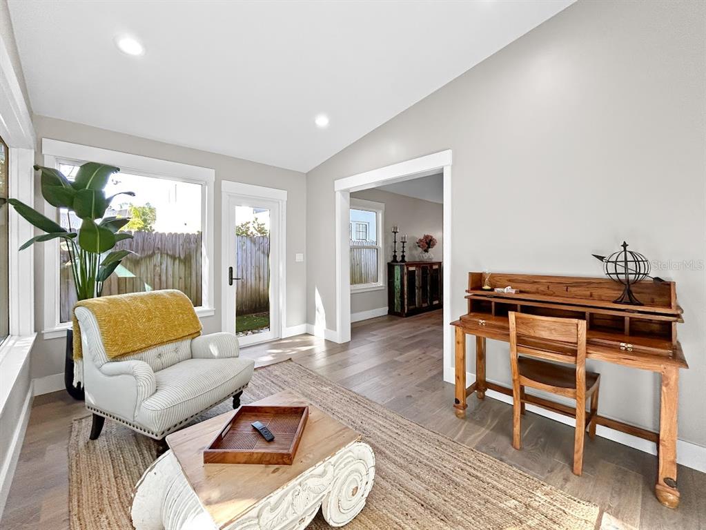 2908 West San Rafael Street Tampa, FL 33629 - Photo 16 of 27 a living room with furniture and a wooden floor