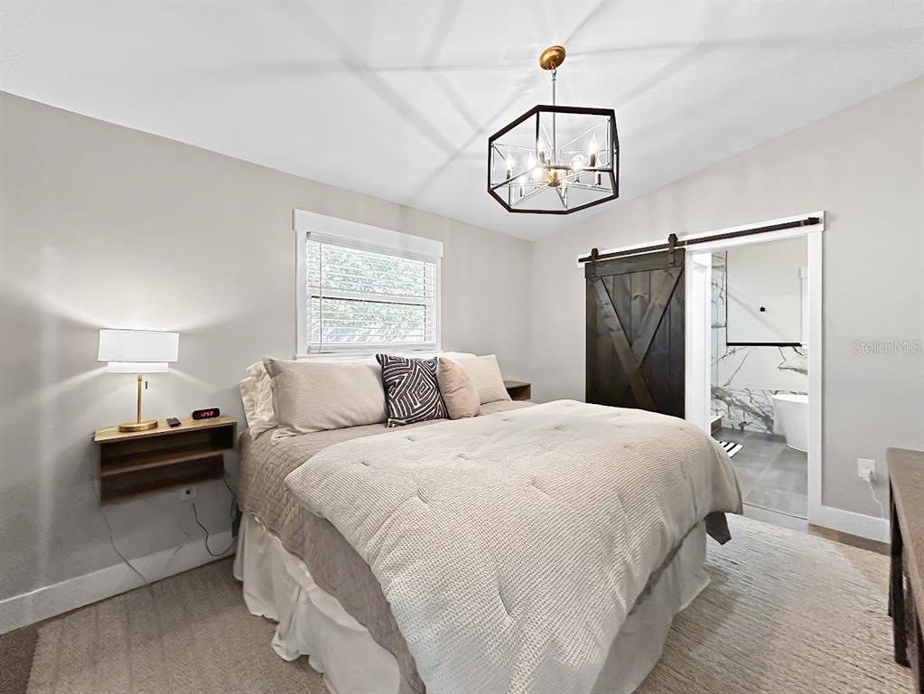 2908 West San Rafael Street Tampa, FL 33629 - Photo 17 of 27 a bedroom with bed and a window