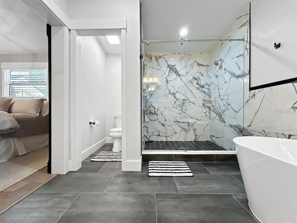 2908 West San Rafael Street Tampa, FL 33629 - Photo 19 of 27 a view of bathroom with bathtub and shower