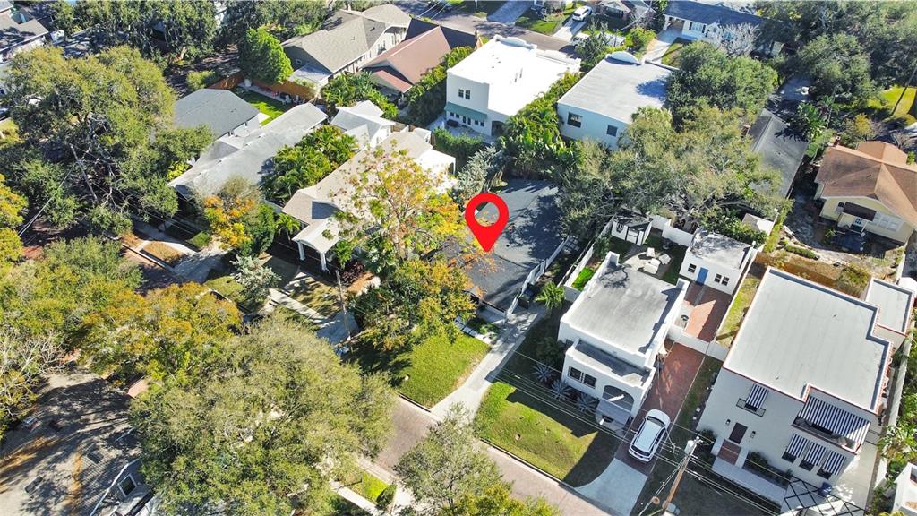 2908 West San Rafael Street Tampa, FL 33629 - Photo 2 of 27 an aerial view of a house with a yard and garden