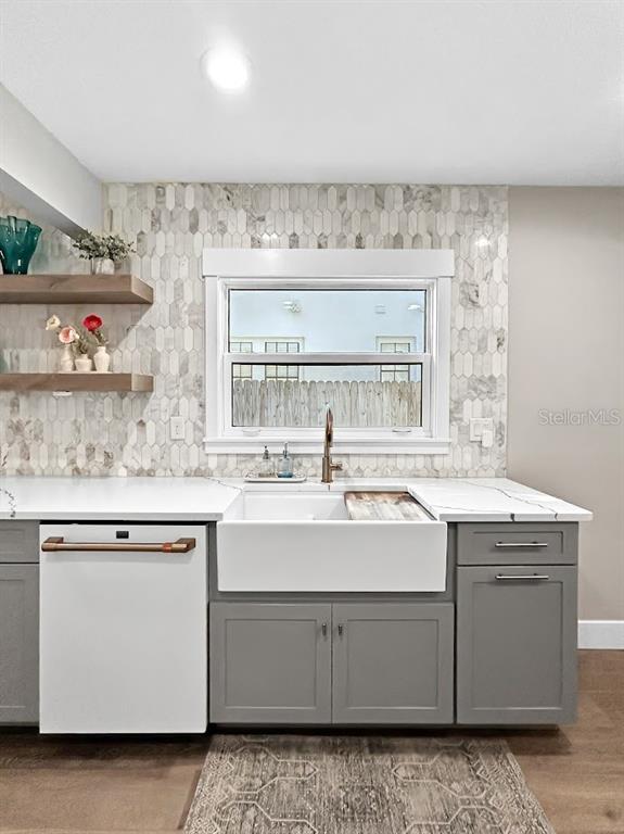 2908 West San Rafael Street Tampa, FL 33629 - Photo 8 of 27 a kitchen with a sink stove and cabinets