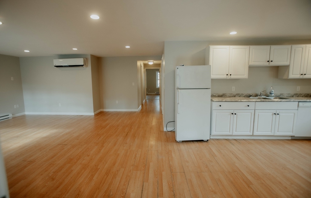 27 Kendall Street Barre, MA 01005 - Photo 12 of 40 a kitchen with granite countertop a stove a refrigerator and a sink