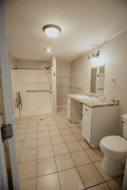 27 Kendall Street Barre, MA 01005 - Photo 16 of 40 a bathroom with a sink a toilet and a mirror