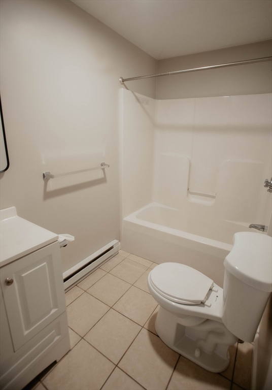27 Kendall Street Barre, MA 01005 - Photo 24 of 40 a white toilet and tub sitting next to a bathroom sink
