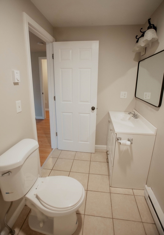 27 Kendall Street Barre, MA 01005 - Photo 25 of 40 a white toilet sitting next to a bathroom sink
