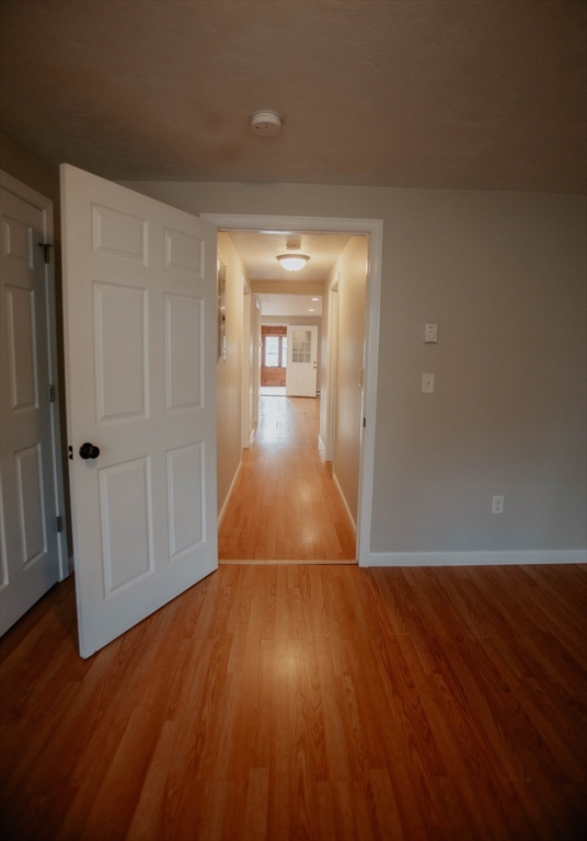 27 Kendall Street Barre, MA 01005 - Photo 31 of 40 wooden floor in an empty room with a window