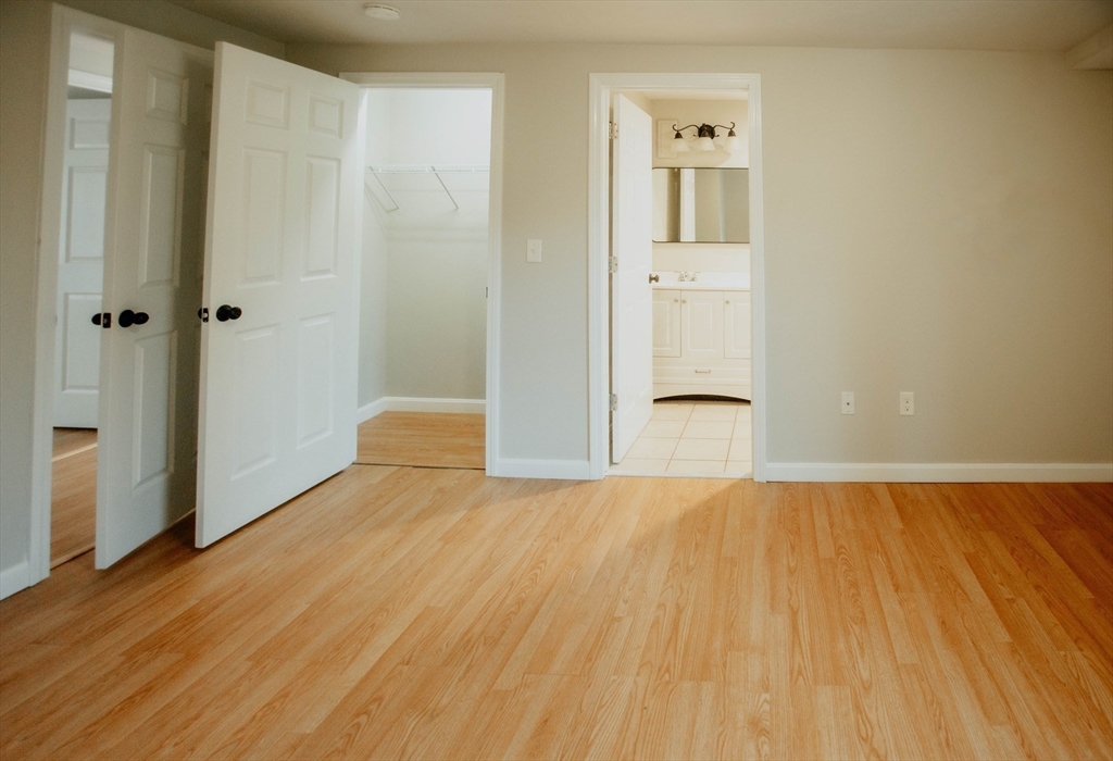 27 Kendall Street Barre, MA 01005 - Photo 33 of 40 a view of empty room with wooden floor and bathroom