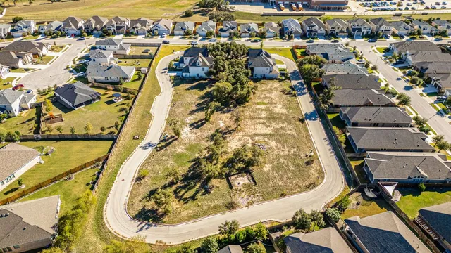 an aerial view of a highlighted house