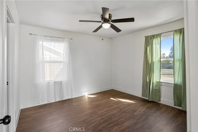 a bathroom with a shower toilet and sink