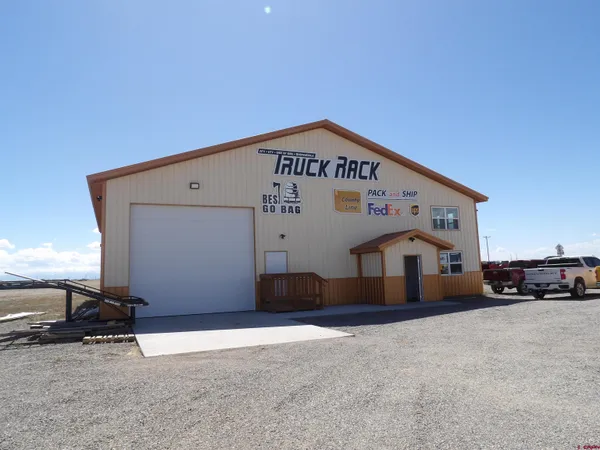 a view of a lake with a big yard